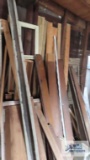 Lot of wooden trim and lumber in garage