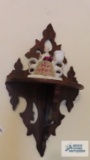 Antique oak wall shelf and antique porcelain figurine