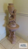 Ceramic figurine on ceramic matching stand
