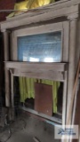 Antique fireplace mantel with mirror