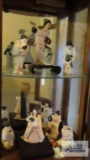 Lot of Oriental figurines in top of cabinet