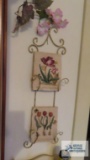 Plate hanger with floral wall hangings