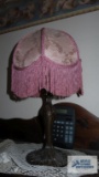 pair of reproduction lamps with pink shades