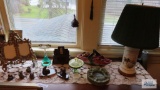 Lot of decorative items including Miller Studio Incorporated thermometer, Barber Shop Limelight
