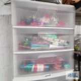 Lot of three plastic storage cabinets with crafting items and decorations
