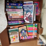 Two boxes of children's VHS tapes including Winnie the Pooh