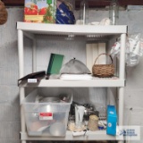 Topsy Turvy planter, assorted metal cookie cutters, Farberware electric griddle, bottles and etc on