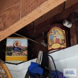 Lot of assorted tins on top of wall