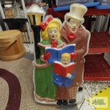 Vintage lighted caroler plastic and metal Christmas decoration