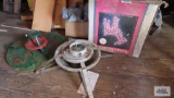 Outdoor lighted reindeer and two Christmas tree stands