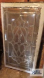 Decorative leaded glass window. Has a chip