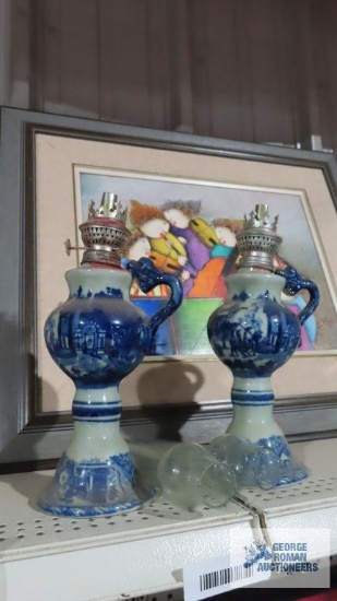 Blue Village scene oil lamps with dragon head handles