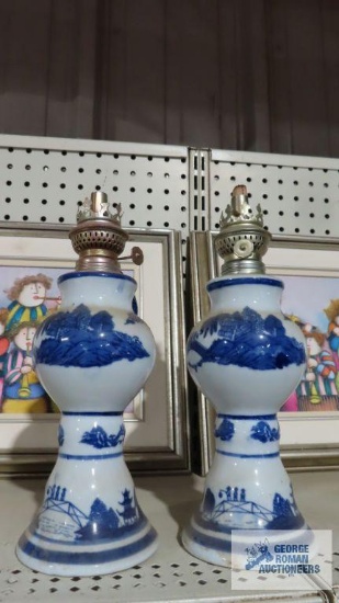 Lot of two oil lamps with dragon handles. Missing shades