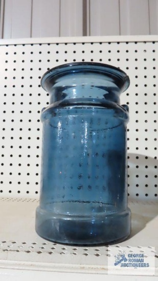 Blue glass anister. Missing lid and has chips.