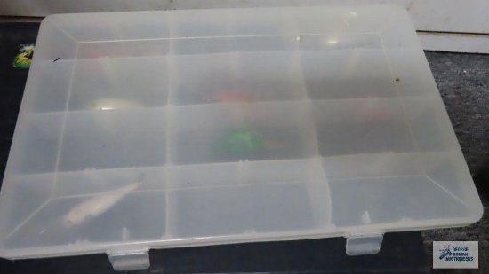 Plastic box with fishing lures
