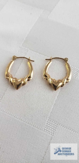 Gold colored X's and heart O's earrings .84 G, marked 14K