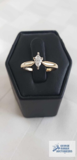Marquise...solitaire gemstone approximately....18ct on gold colored band marked 14K, 2.0 G
