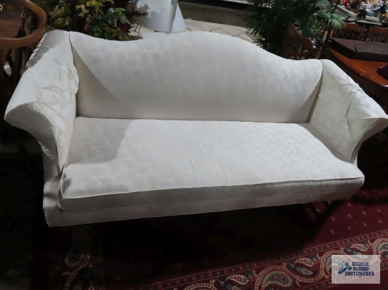 White brocade style sofa