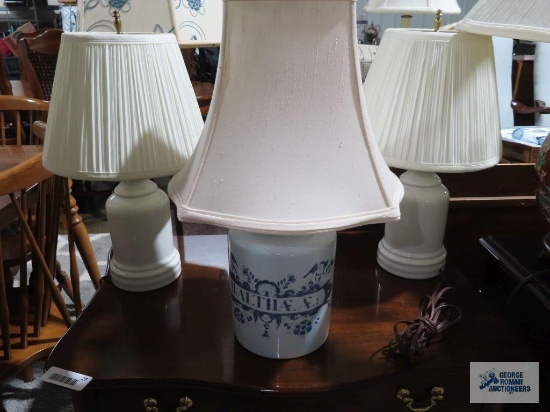 Pair of white ceramic lamps and other lamp