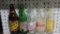 Lot of five advertising beverage bottles