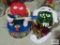 M & M...animated guitar playing figurine and sled riding ornament