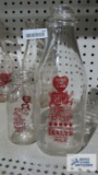Two Isaly's milk bottles