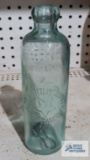 Antique Star Bottling Works bottle with partial lid