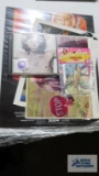 Betty Page vinyl stickers, The Doors CD, and movie advertisements
