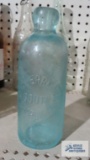 J. C. Herrmann, South Sharon, PA blue bottle, has crack in bottom