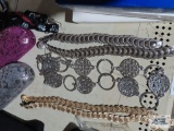 Lot of ladies decorative belts, sunglass cases, makeup bag and lanyards