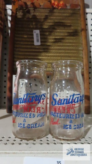 Pair of Sanitary's pasteurized milk and ice cream bottles