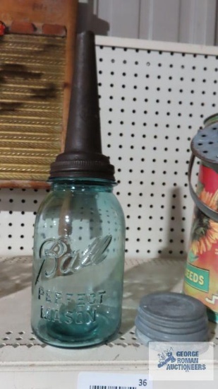 The Master Mfg. Co. antique gasoline top on mason jar