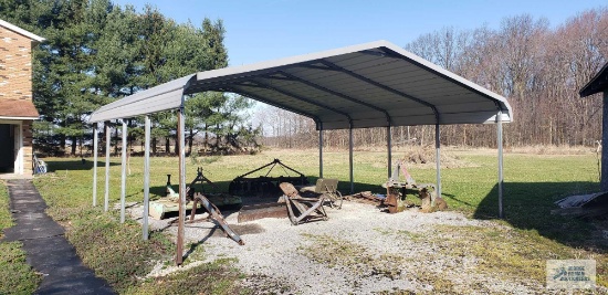 20 ft by 20 ft Carport. Approx. 9.5 ft at top of peak. Additional removal time available upon