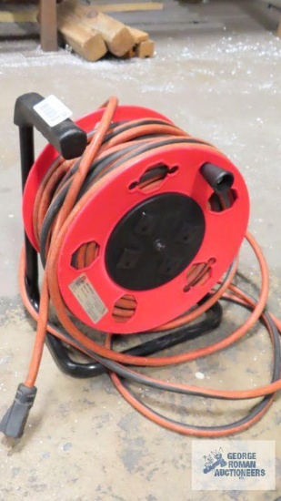 Heavy duty extension cord with freestanding reel