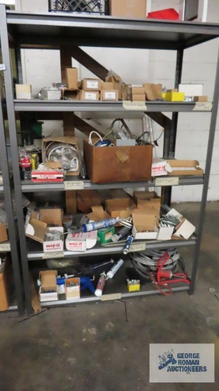 Lot of concrete anchors, hardware, electrical items, and etc on one section of shelving