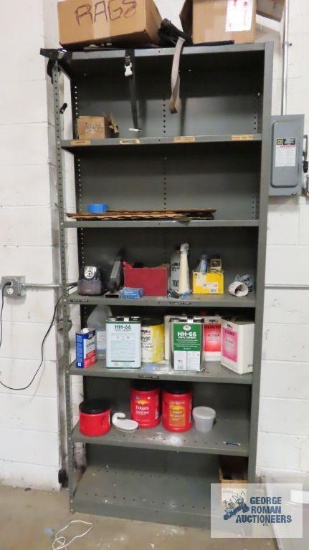 Adjustable metal shelving with vinyl cement, catalyst, cleaner, pencil sharpener and etc