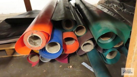 Lot of multicolored rolls of fabric