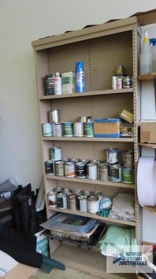 Metal adjustable shelving with painting supplies and etc