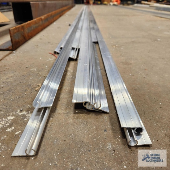Lot of aluminum pieces. Most are 18 ft long.