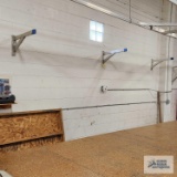 Three aluminum wall brackets