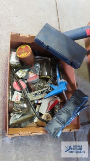Hardware, grinding wheels, and assorted tools in box