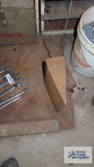 Steel plate with heavy steel wedge and window weights