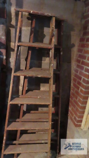 Two 6 ft wooden step ladders