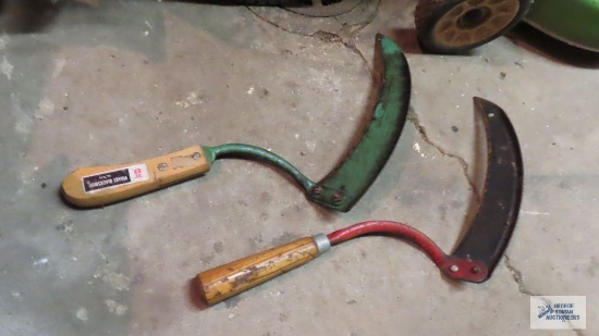 Two vintage hand scythes