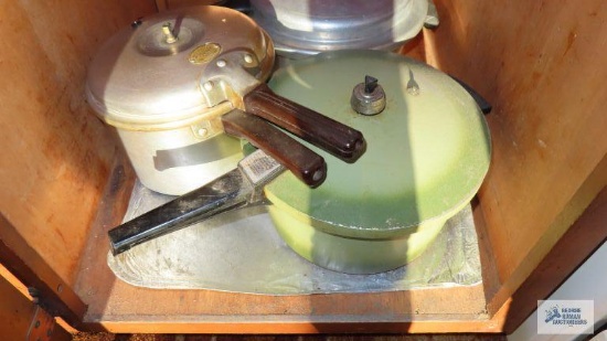 Vintage pressure cookers and roaster