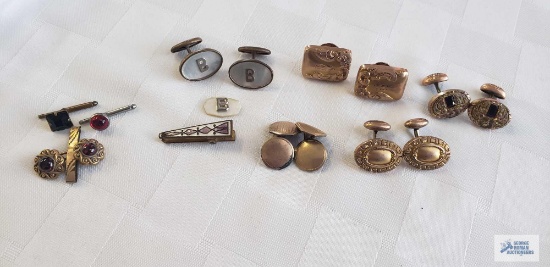 Vintage cufflinks with tie clip and three singles