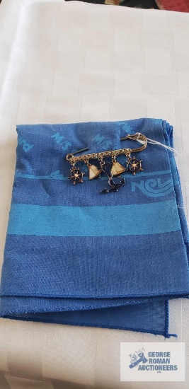 Nautical stick pin on souvenir cruise ship scarf
