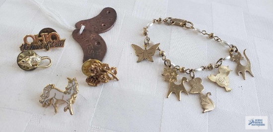 Pins, bracelet, and copper shoe cleats