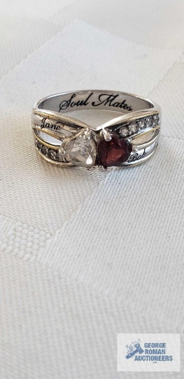 Clear and red gemstone with smaller clear gemstones ring, inscribed Jane and Bob, marked 925 and