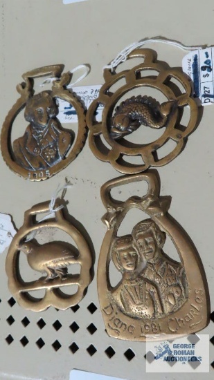 lot of brass bridle decorations